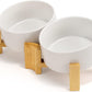 SPUNKYJUNKY 15° Slanted Ceramic Dog and Cat Bowl with Wooden Stand, Tilted Bulldog Food and Water Bowl No Slip Non-Spill for Cats Medium Dogs Big Face Pets 28.7 OZ (3.6 Cups, White × 2)