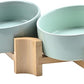 SPUNKYJUNKY 15° Slanted Ceramic Dog and Cat Bowl with Wooden Stand, Tilted Bulldog Food and Water Bowl No Slip Non-Spill for Cats Medium Dogs Big Face Pets 13.5 OZ (1.7 Cups, Morandi Green × 2)