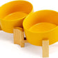 SPUNKYJUNKY 15° Slanted Ceramic Dog and Cat Bowl with Wooden Stand, Tilted Bulldog Food and Water Bowl No Slip Non-Spill for Cats Medium Dogs Big Face Pets 28.7 OZ (3.6 Cups, Yellow × 2)