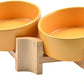 SPUNKYJUNKY 15° Slanted Ceramic Dog and Cat Bowl with Wooden Stand, Tilted Bulldog Food and Water Bowl No Slip Non-Spill for Cats Medium Dogs Big Face Pets 13.5 OZ (1.7 Cups, Yellow × 2)
