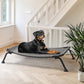 Veehoo Outdoor Elevated Dog Bed, Cooling Raised Dog Cot Bed XL, Portable Waterproof Curved Dogs Hammock Beds for Outside, up to 150lbs, Black Legs, Black Silver 49"