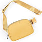 ODODOS Unisex Mini Belt Bag with Adjustable Strap Small Fanny Pack for Workout Running Traveling Hiking, Buff Yellow
