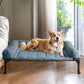 Veehoo Cooling Elevated Dog Bed with Fluffy Plush Bolster Cushion, Indoor Raised Dog Beds for Large Dogs, Soft Pet Sofa Cot with Removable Washable Mat, No-Slip Feet, 32 x 25 inches, Haze Blue