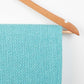 Arkwright Common Ground Bulk Blankets - Pack of 12 - Reversible 100% Cotton All Season Lightweight Couch Bed Throws for Wedding Guests, Travel, and Outdoor Events, 50 x 70 in, Aqua