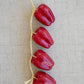 String of Artificial Red Bell Peppers
