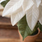 White Artificial Poinsettia in Cement Pot