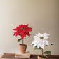 White Artificial Poinsettia in Cement Pot